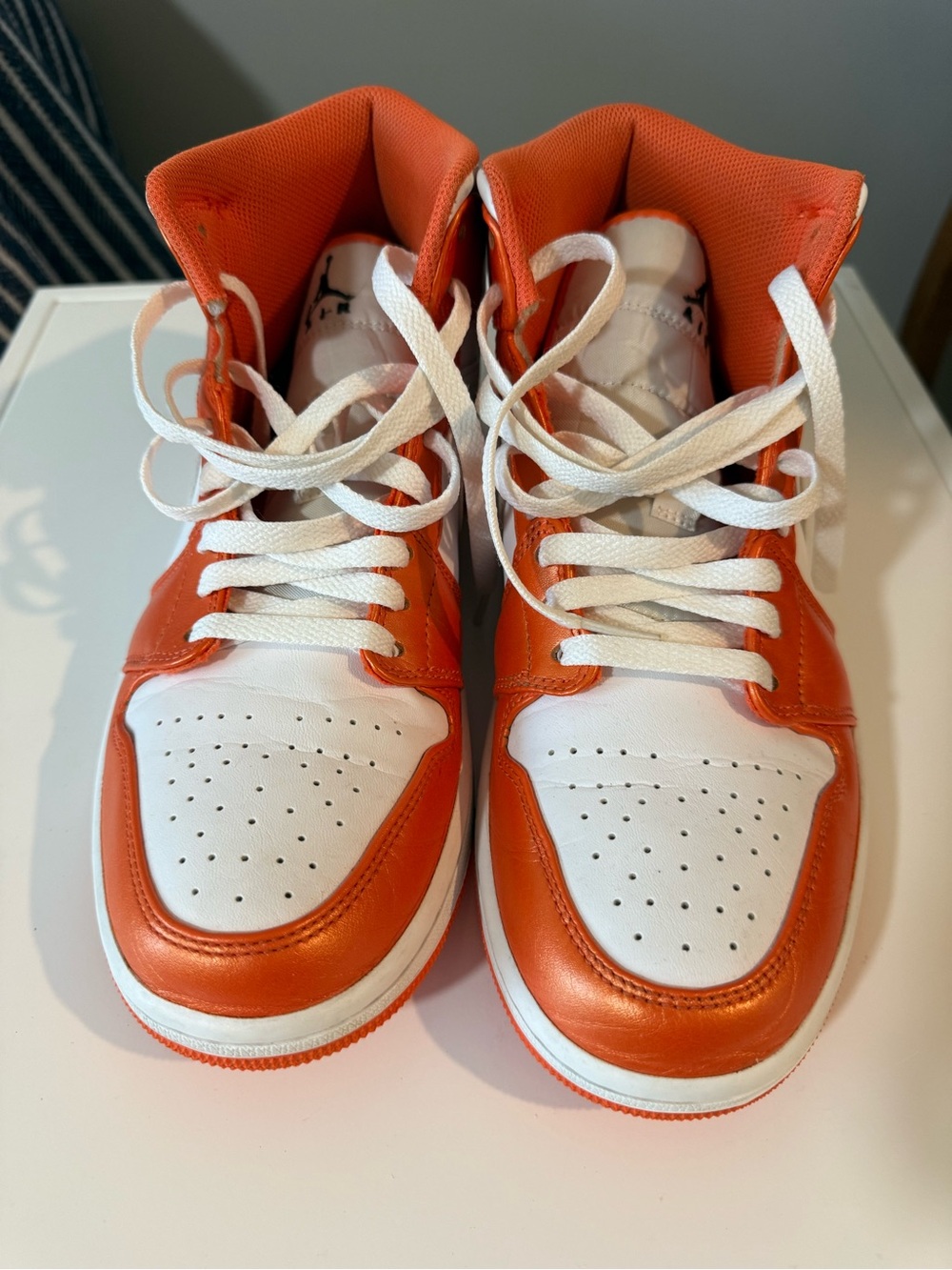 The Air Jordan 1 Mid Metallic Orange
